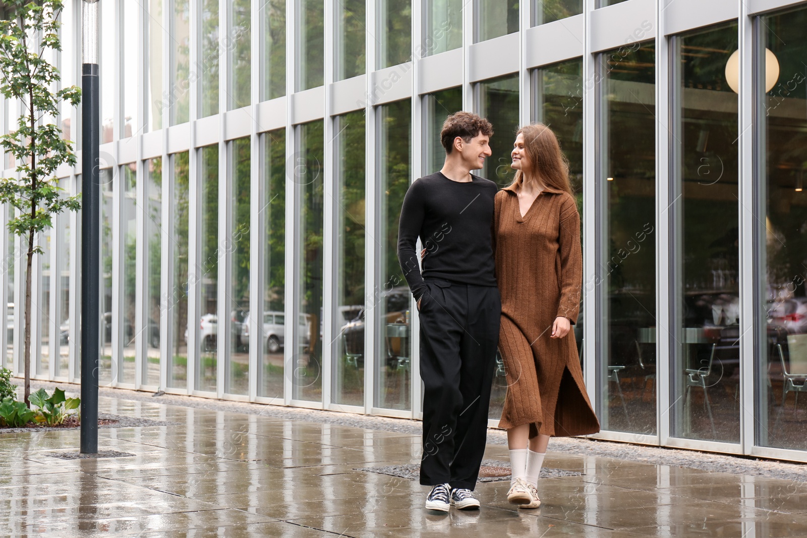 Photo of International dating. Lovely young couple spending time together outdoors, space for text