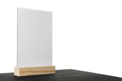 Photo of Menu holder on black wooden table against white background. Space for text