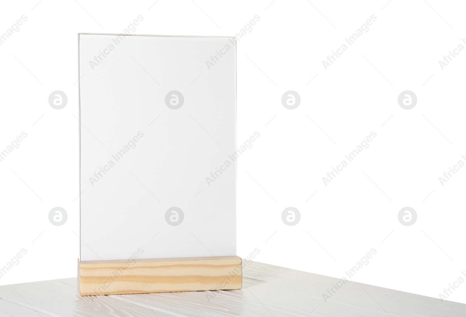 Photo of Menu holder on wooden table against white background. Space for text