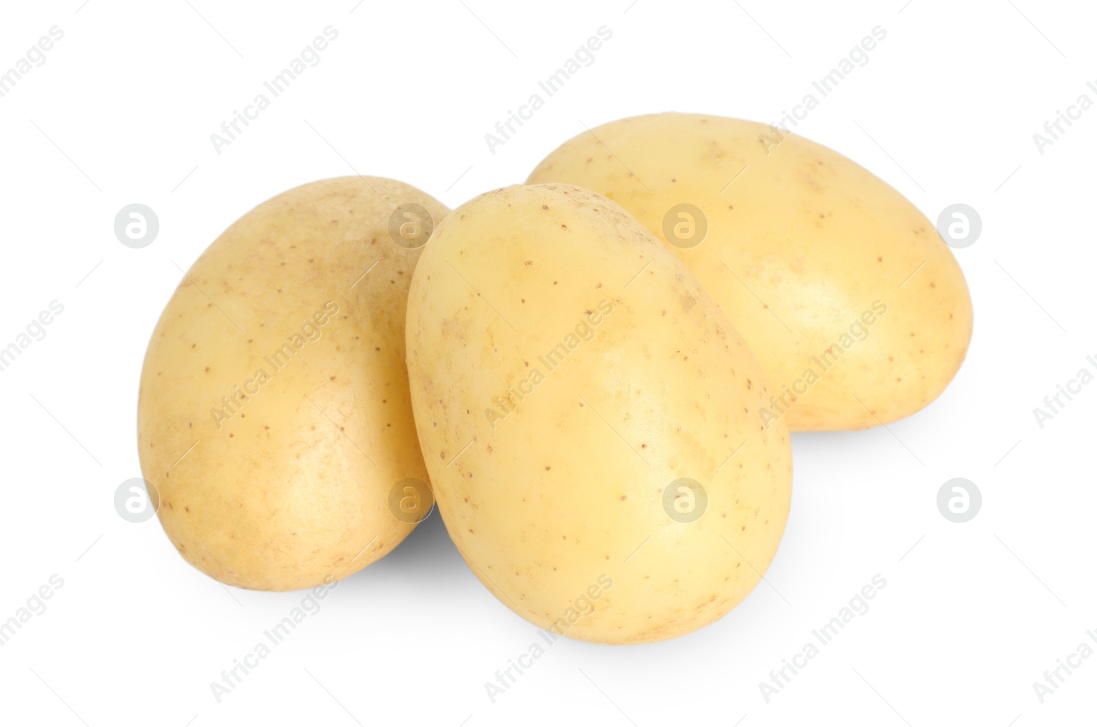 Photo of Three young fresh potatoes isolated on white