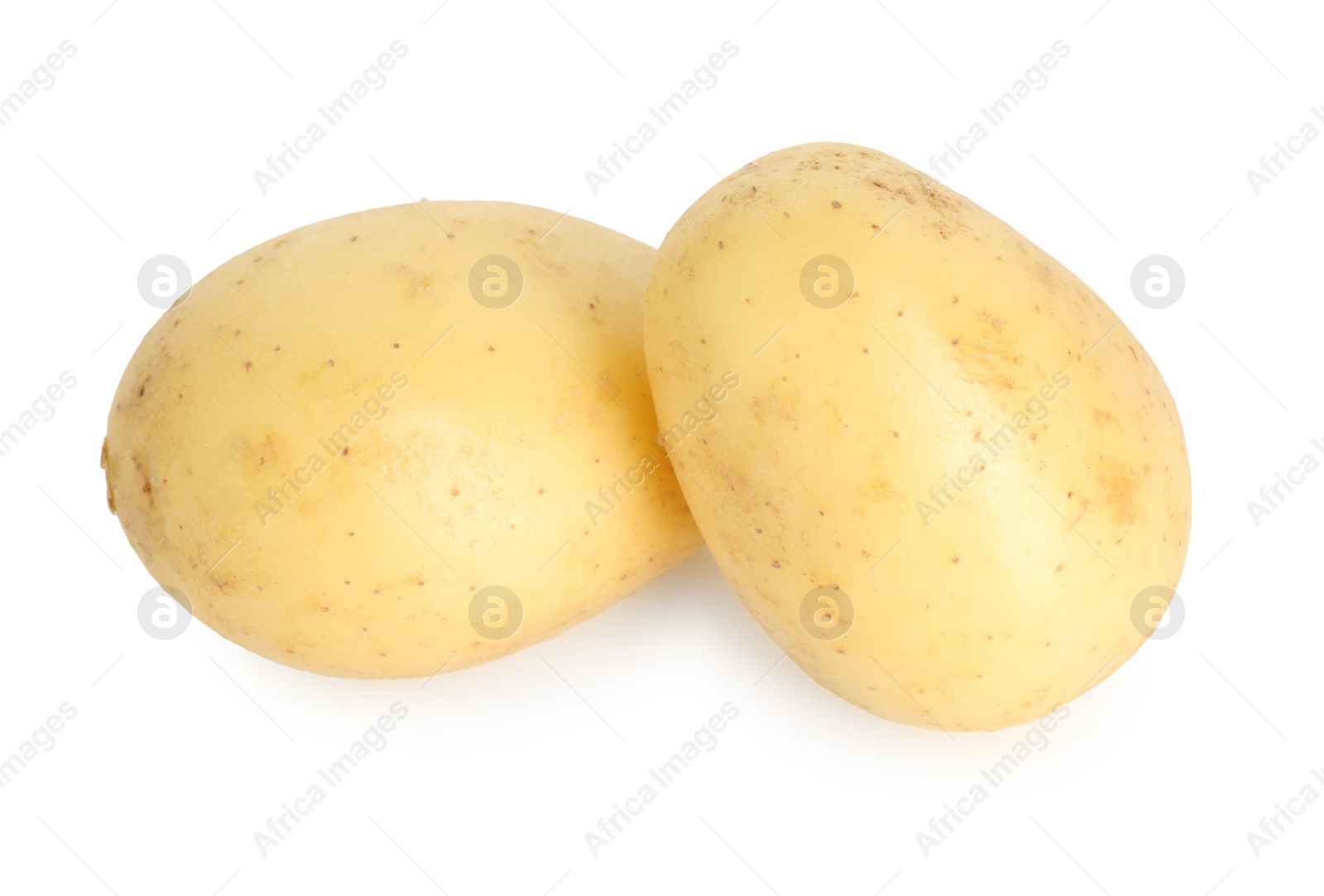 Photo of Two young fresh potatoes isolated on white