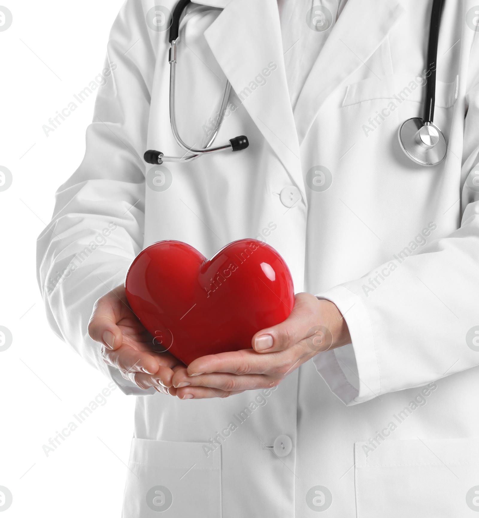 Photo of Doctor with red heart on white background, closeup