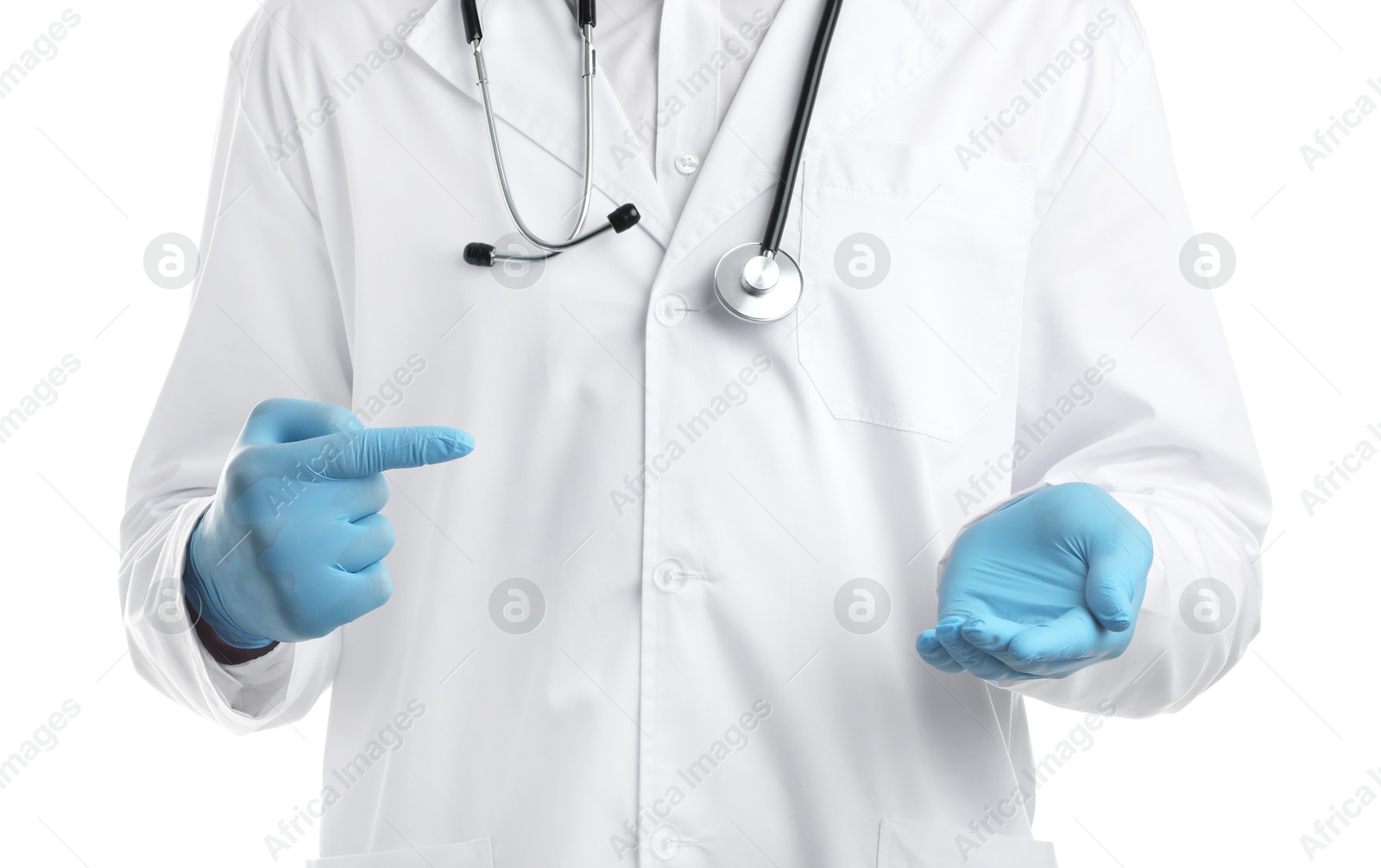 Photo of Doctor pointing at something on white background, closeup