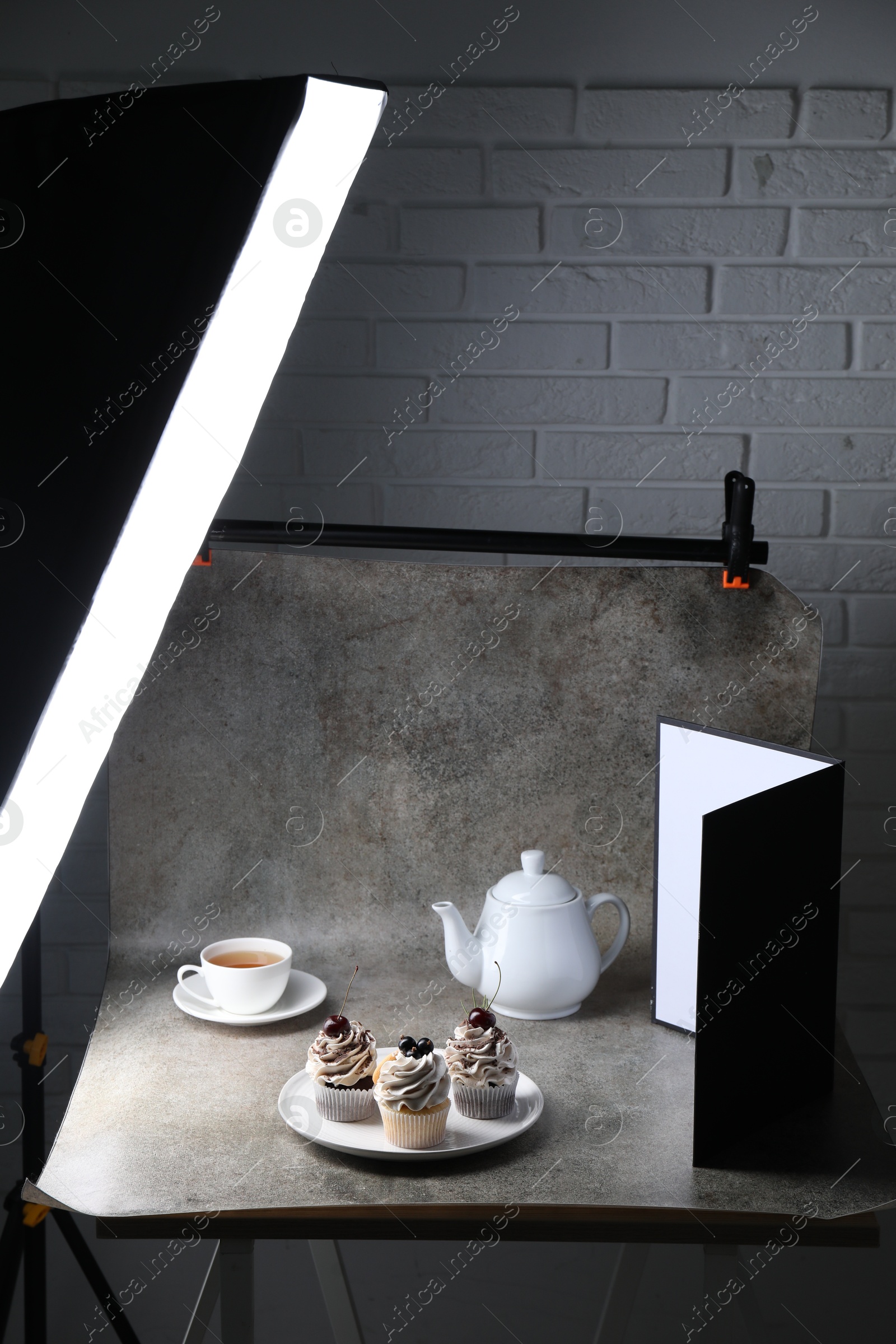 Photo of Shooting food in photo studio with professional lighting equipment