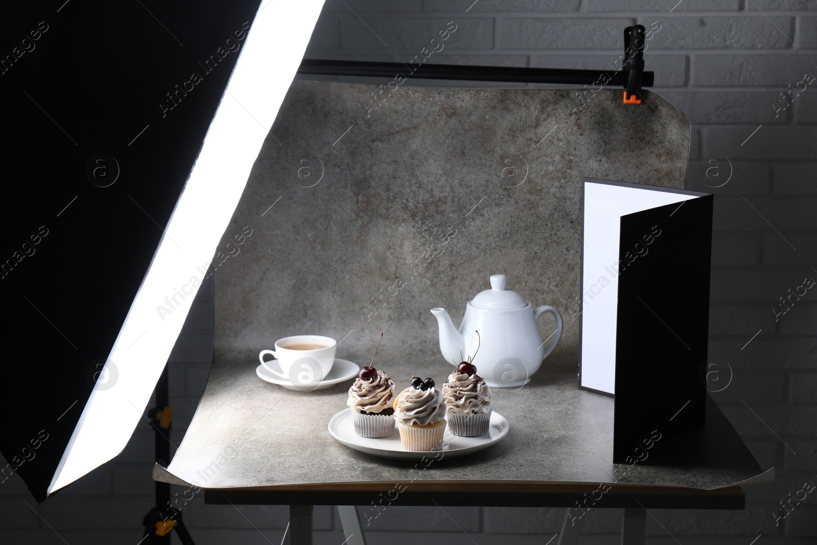 Photo of Shooting food in photo studio with professional lighting equipment