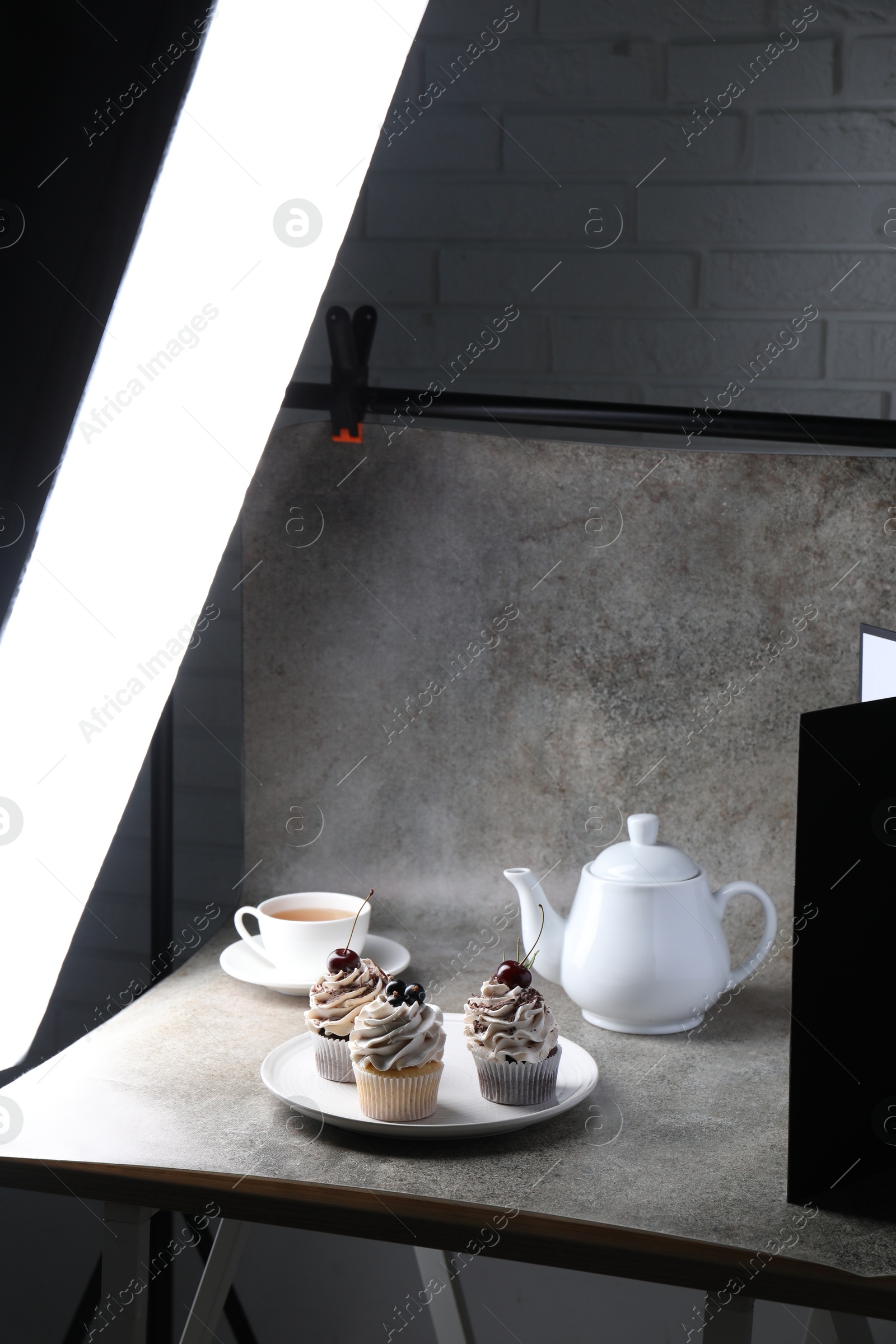 Photo of Shooting food in photo studio with professional lighting equipment