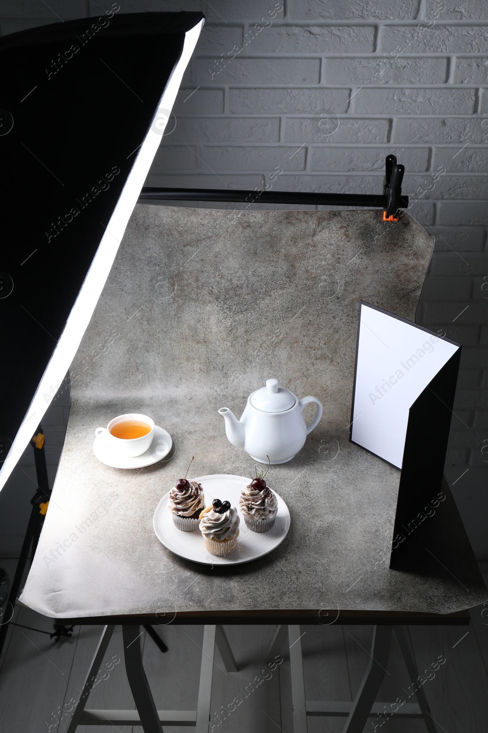 Photo of Shooting food in photo studio with professional lighting equipment