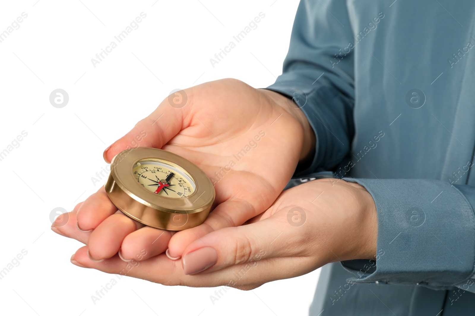 Photo of Woman holding compass on white background, closeup