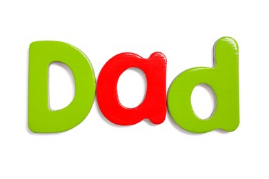 Alphabet. Word Dad of magnetic letters isolated on white, top view