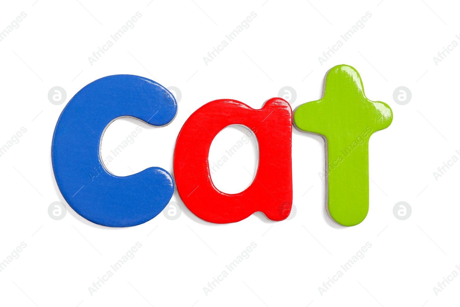 Photo of Alphabet. Word Cat of magnetic letters isolated on white, top view
