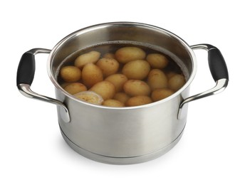 Raw potatoes in pot with water isolated on white