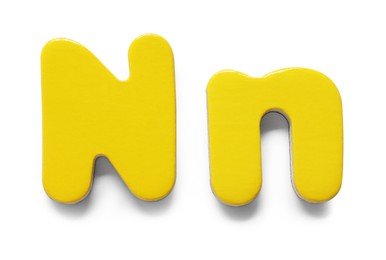 Uppercase and lowercase yellow magnetic letter N isolated white