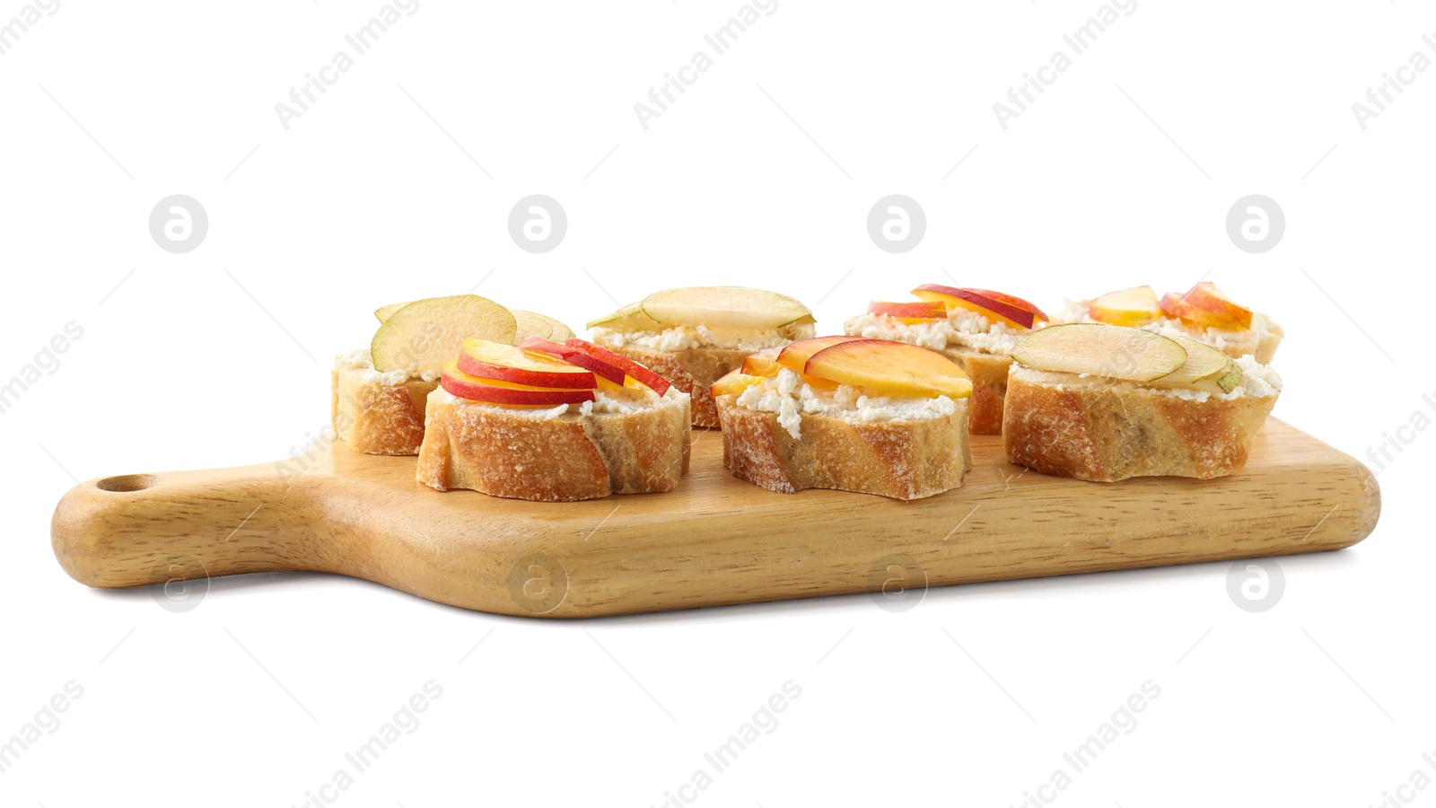 Photo of Delicious ricotta bruschettas with pears and apricots isolated on white