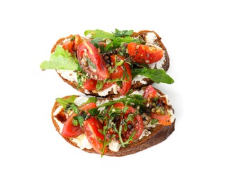 Photo of Delicious bruschettas with ricotta cheese, tomatoes and arugula isolated on white, top view