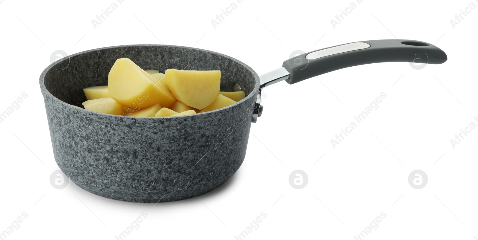 Photo of Raw potatoes in saucepan isolated on white