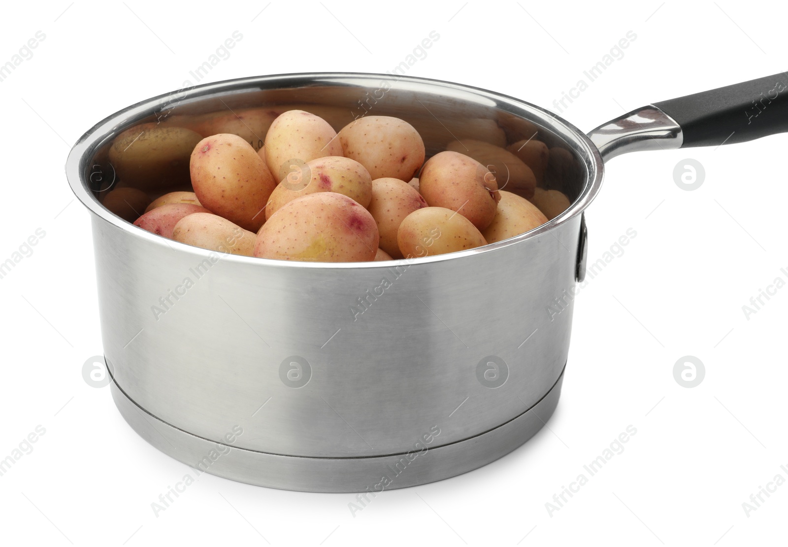 Photo of Raw potatoes in saucepan isolated on white