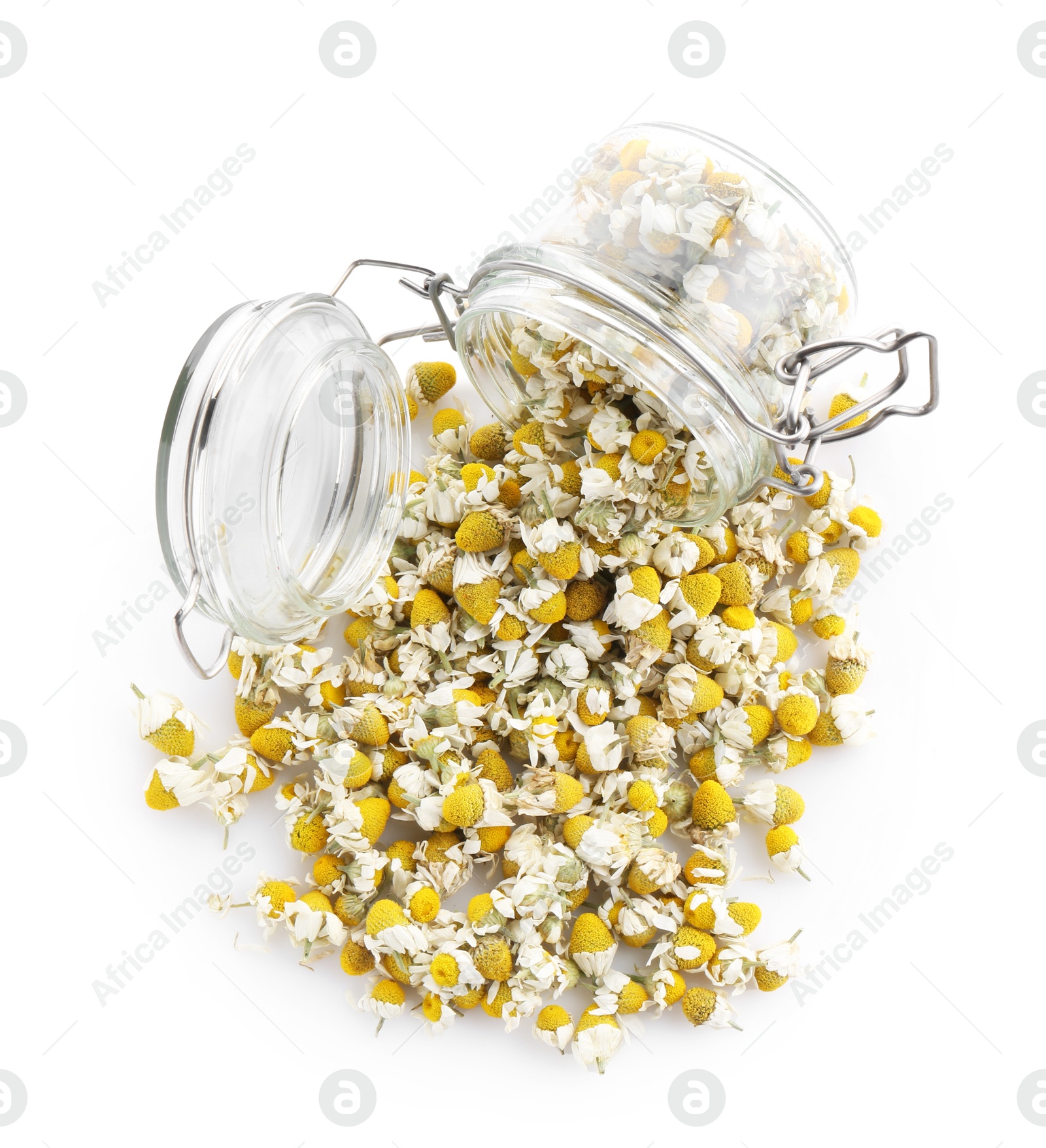 Photo of Chamomile flowers and glass jar isolated on white, top view