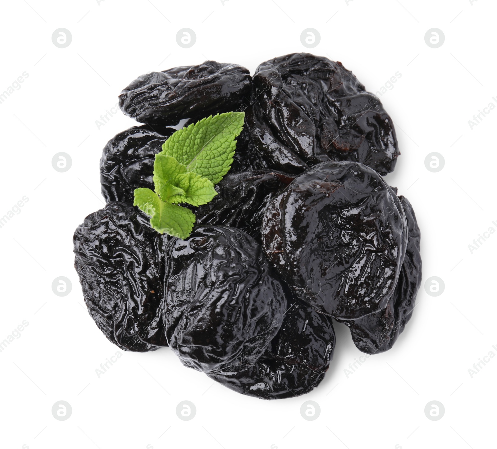 Photo of Tasty dried plums (prunes) and mint leaves isolated on white, top view