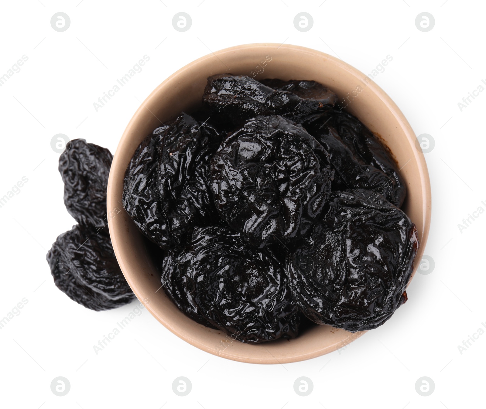 Photo of Tasty dried plums (prunes) in bowl on white background, top view