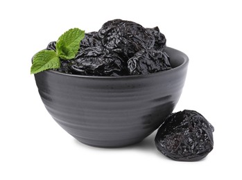 Photo of Tasty dried plums (prunes) and mint leaves in bowl on white background