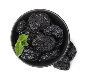 Photo of Tasty dried plums (prunes) and mint leaves in bowl on white background, top view