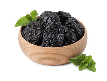 Photo of Tasty dried plums (prunes) and mint leaves in wooden bowl on white background