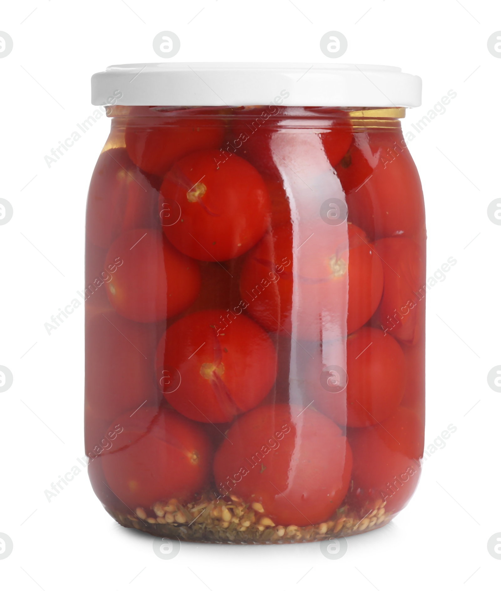 Photo of Tasty pickled tomatoes in jar isolated on white