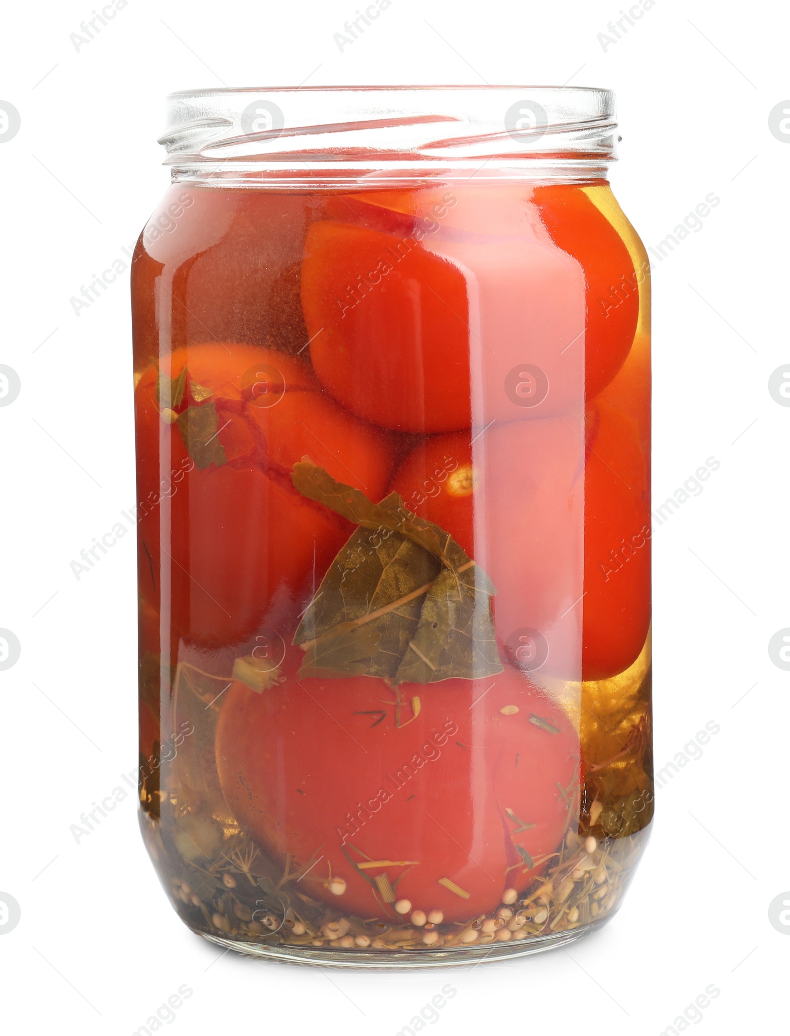 Photo of Tasty pickled tomatoes in jar isolated on white