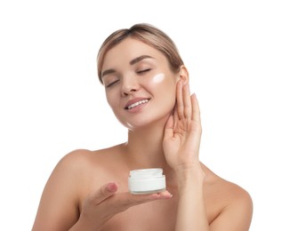 Beautiful woman with jar of face cream on white background