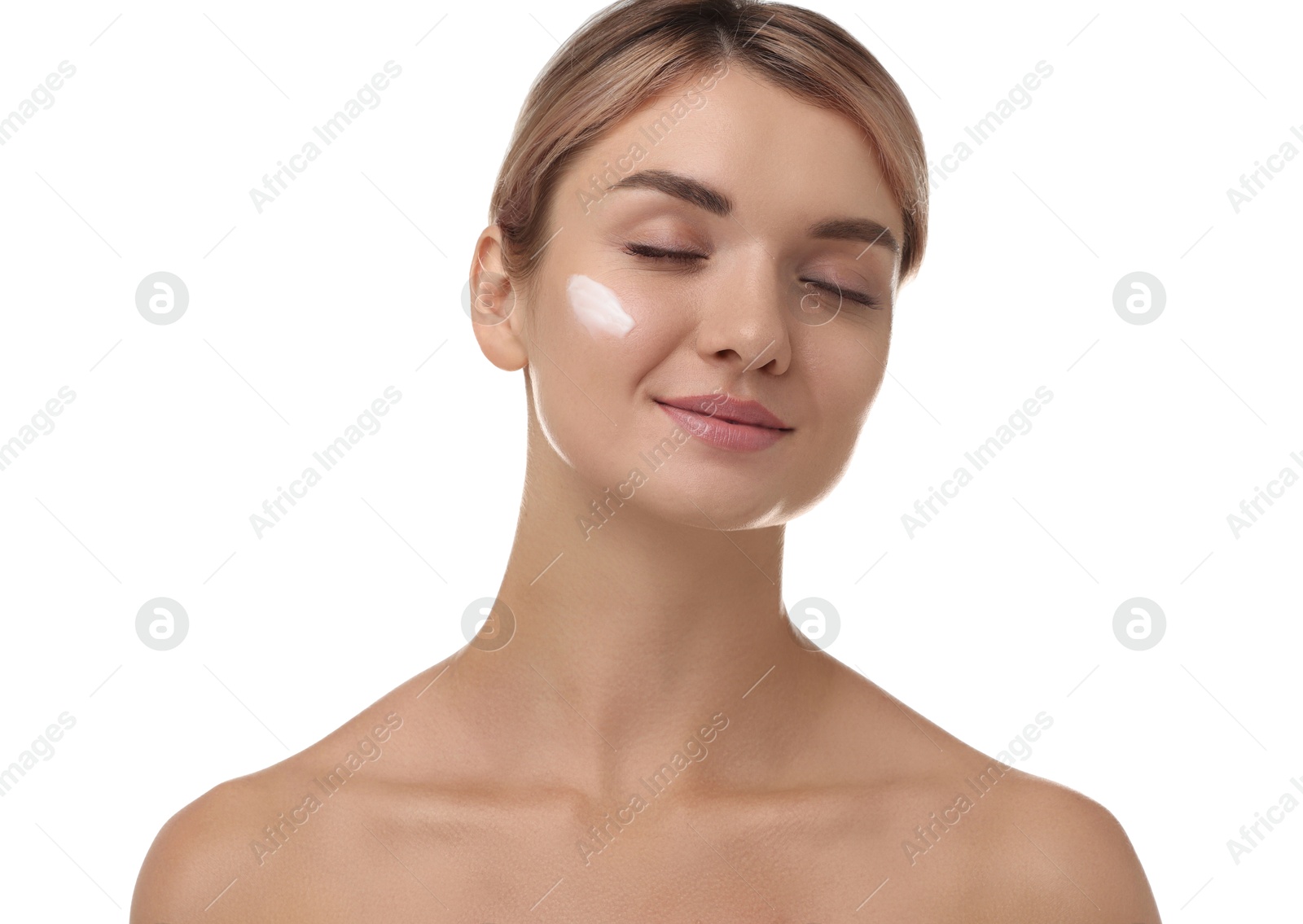 Photo of Beautiful woman with cream on her face against white background