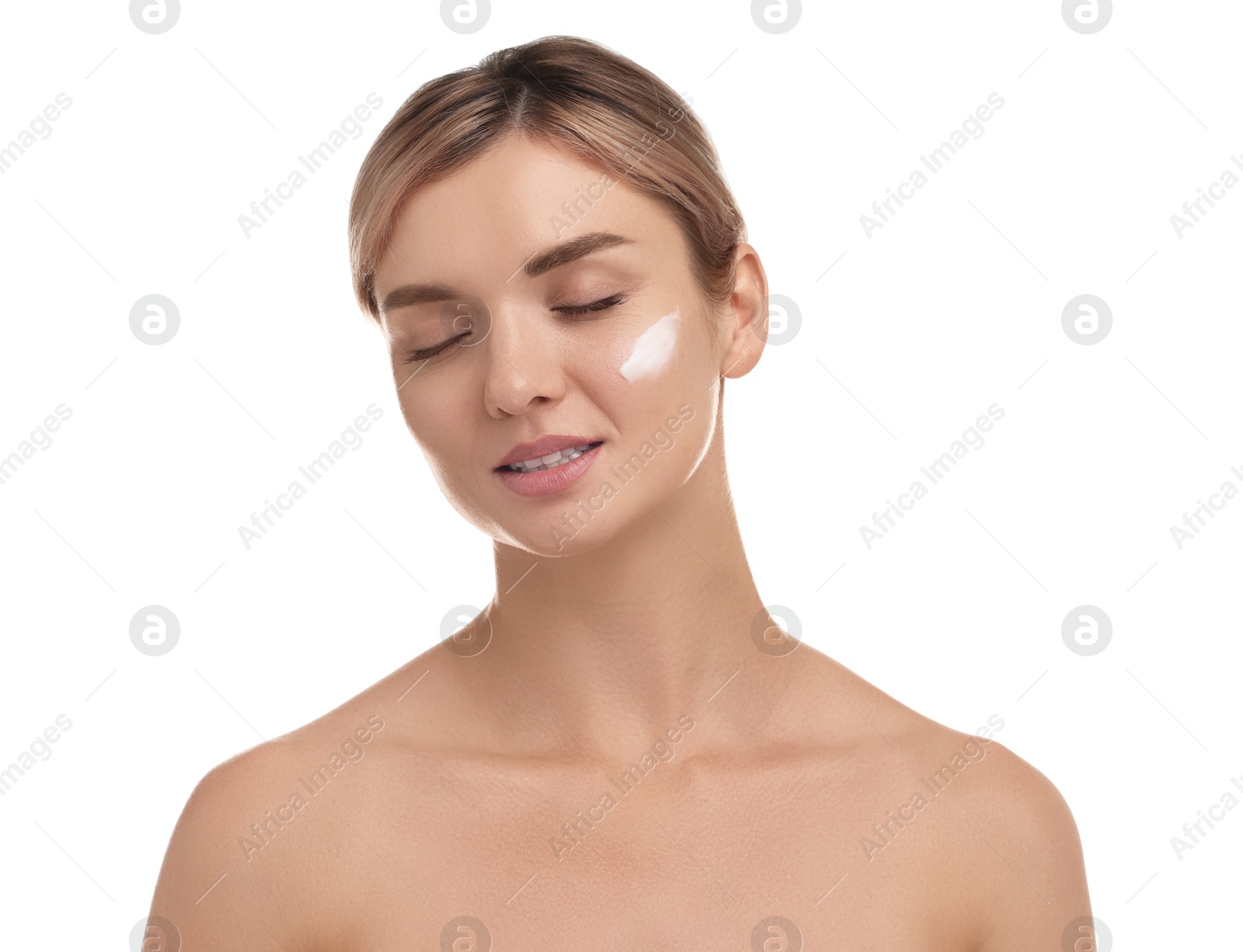 Photo of Beautiful woman with cream on her face against white background