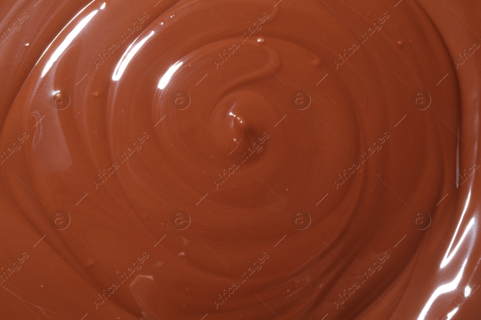 Photo of Tasty melted chocolate as background, top view