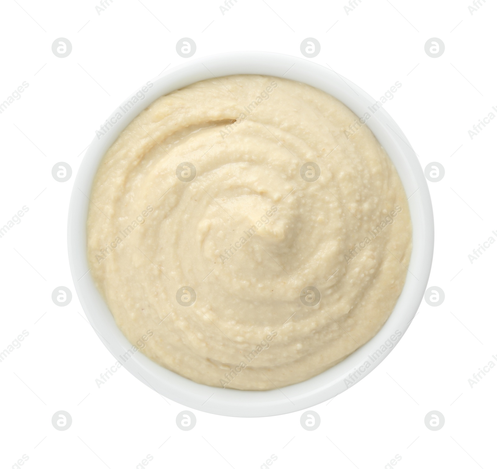 Photo of Delicious hummus in bowl isolated on white, top view