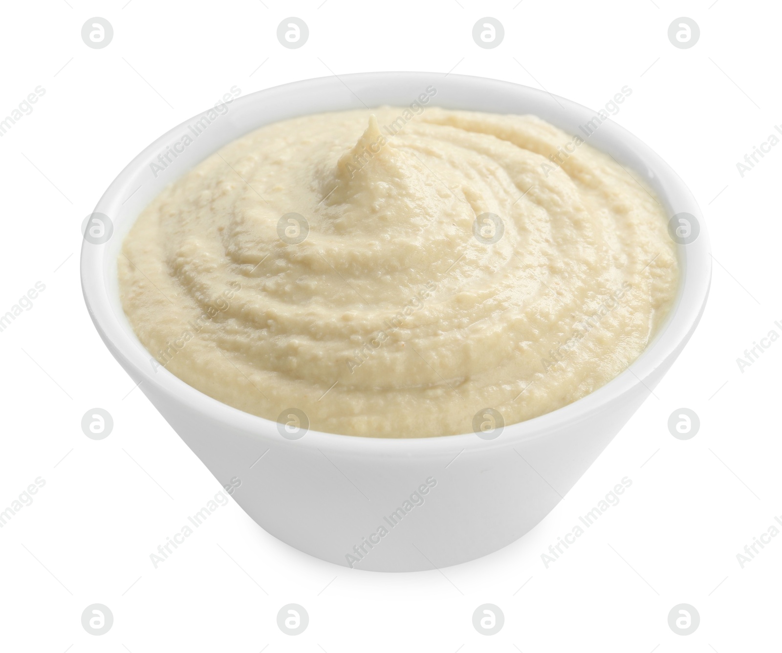 Photo of Delicious hummus in bowl isolated on white