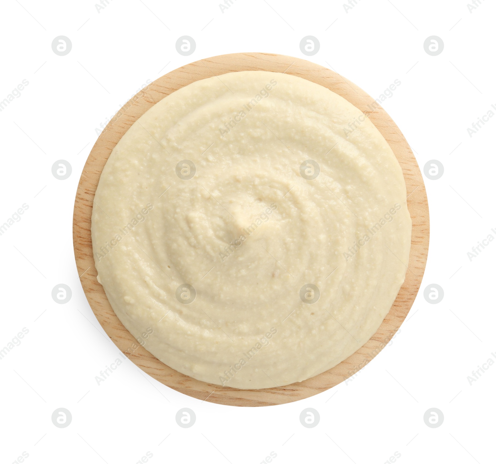 Photo of Delicious hummus in bowl isolated on white, top view