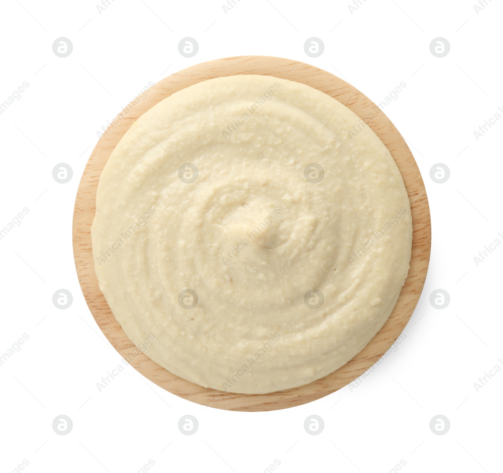 Photo of Delicious hummus in bowl isolated on white, top view