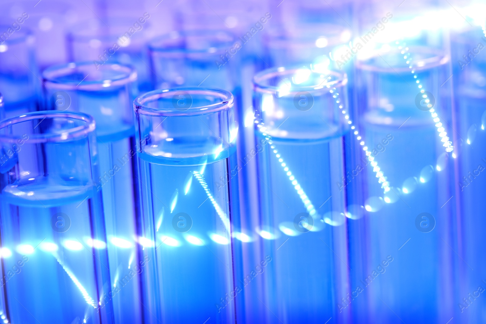 Image of Illustration of DNA and test tubes with samples, double exposure