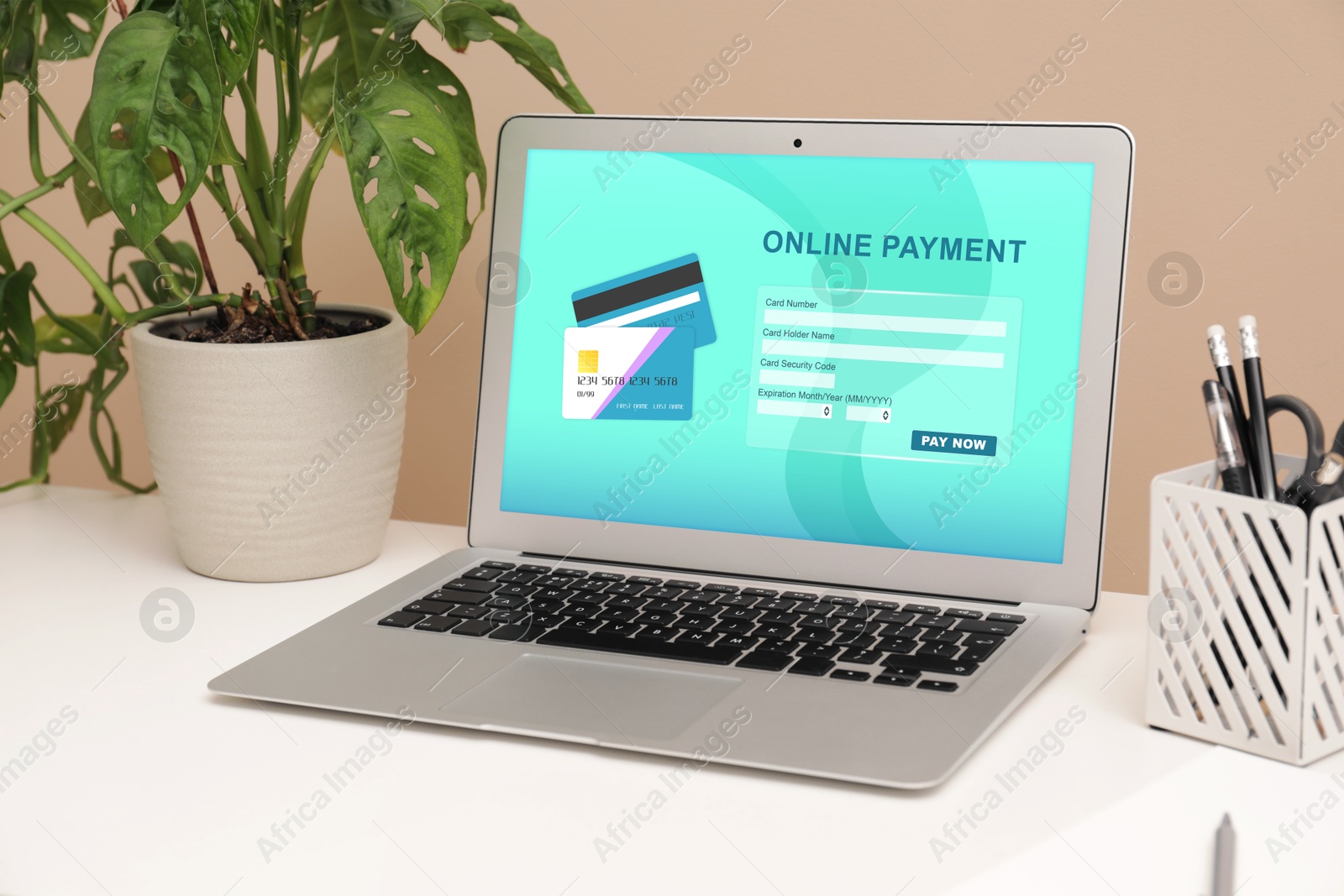 Image of Online payment system. Laptop with open application on table