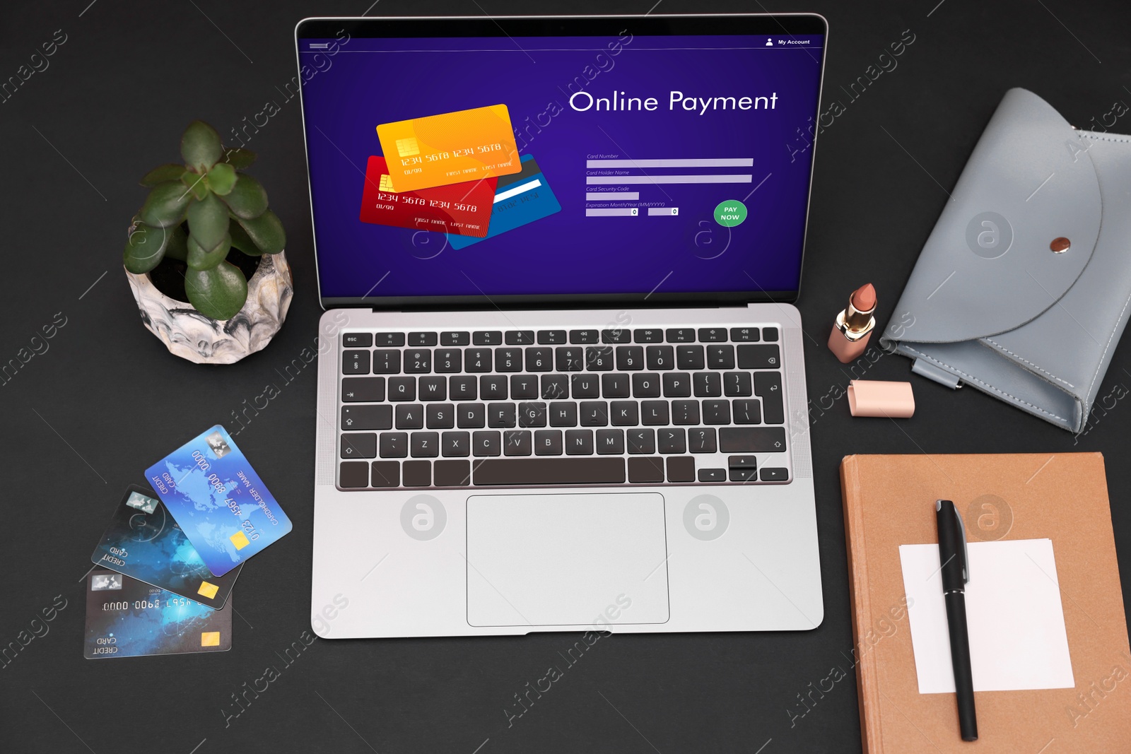 Image of Online payment system. Laptop with open application on table