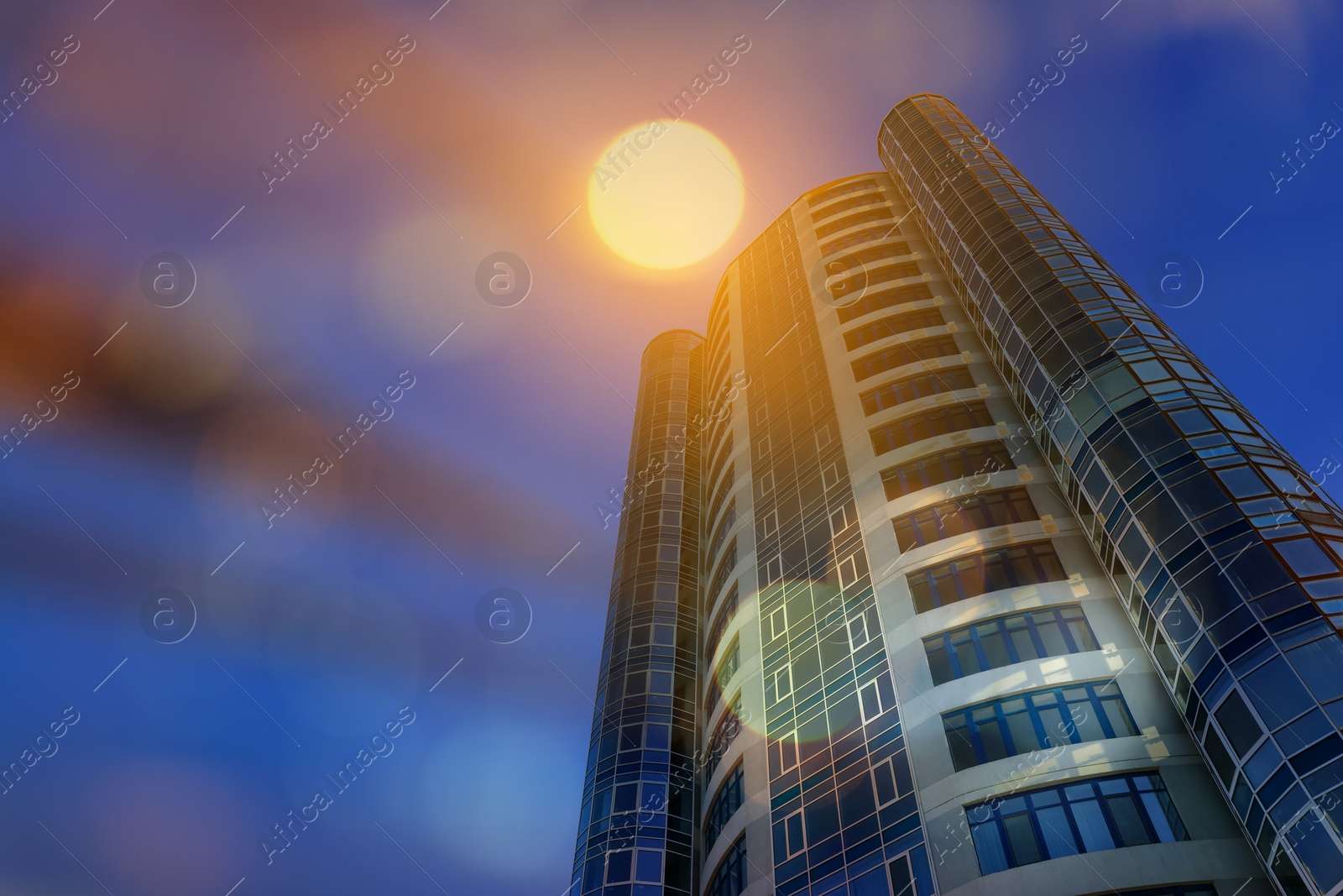 Image of Skyscraper and blurred lights, low angle view. Double exposure