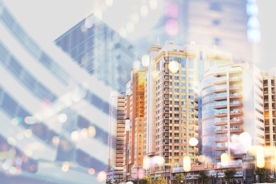 Image of City with buildings and blurred lights, double exposure