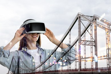 Image of Developer using virtual reality headset in project. Modern technology. Double exposure of woman and bridge