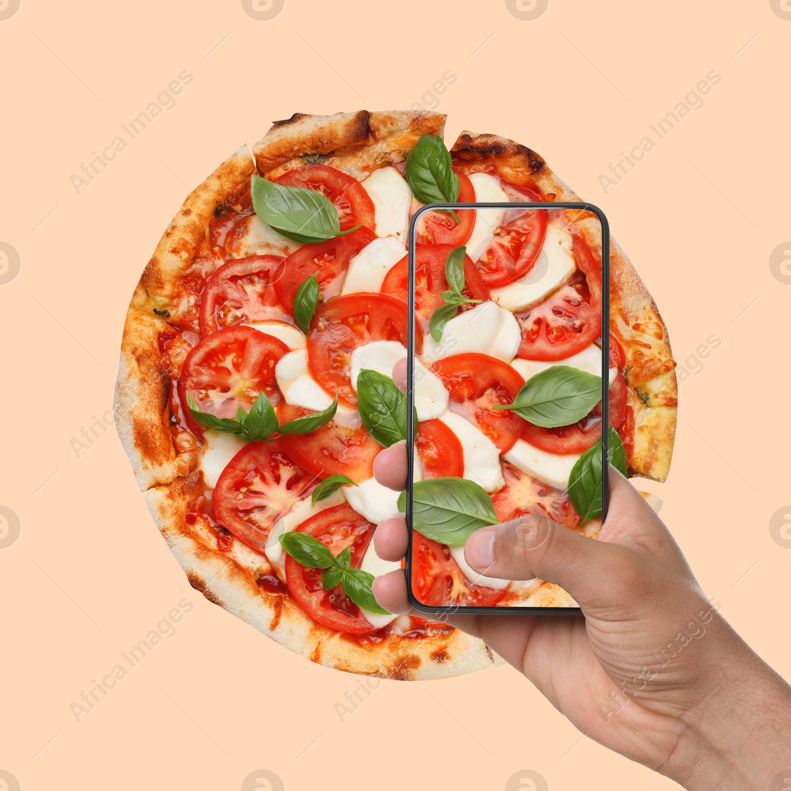 Image of Man taking photo of pizza on beige background, top view