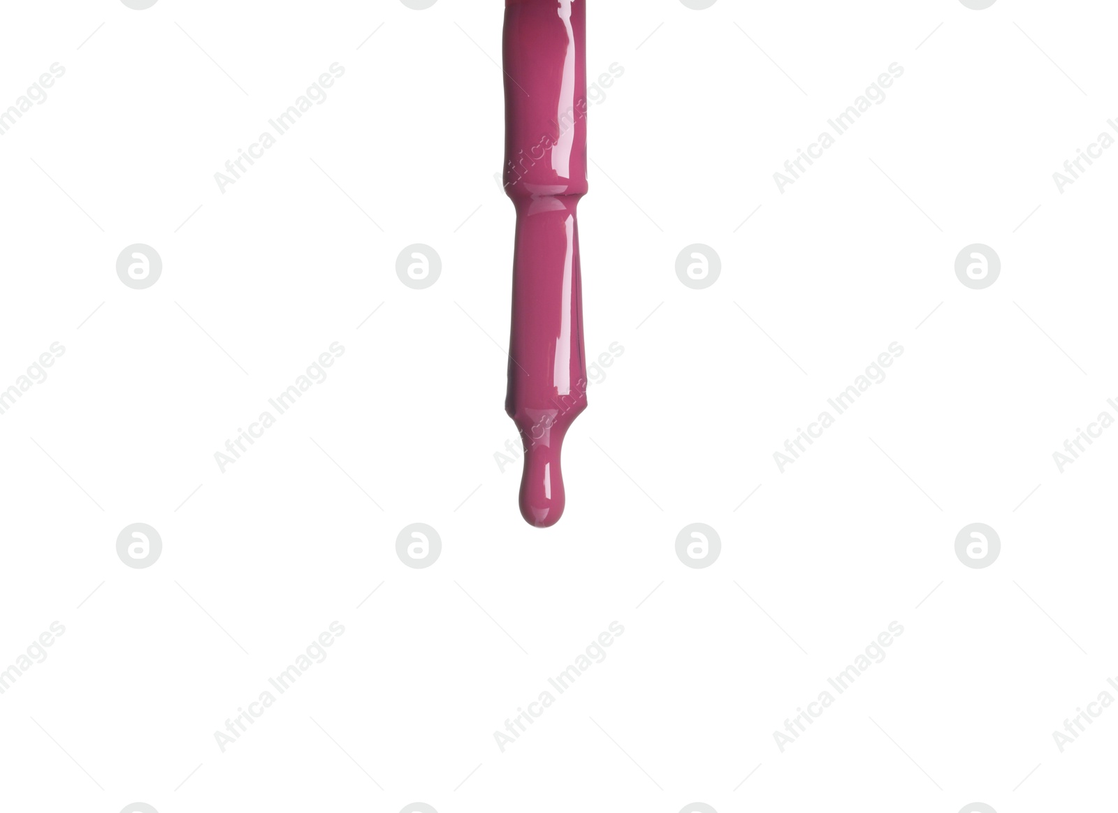 Photo of Purple nail polish dripping from brush isolated on white