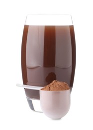 Delicious protein shake in glass and scoop with powder isolated on white