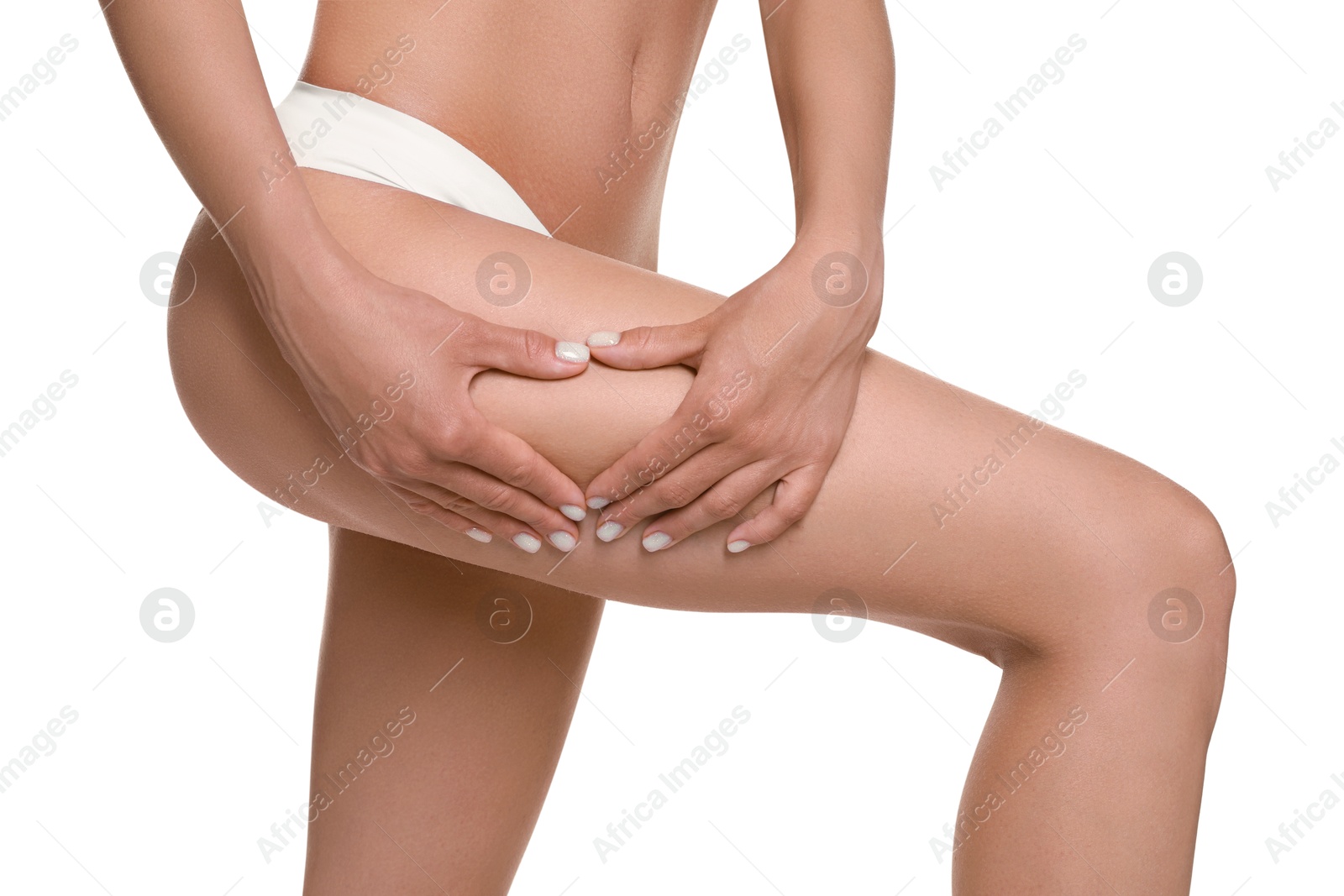 Photo of Woman in underwear making heart with hands near thigh on white background, closeup. Cellulite problem
