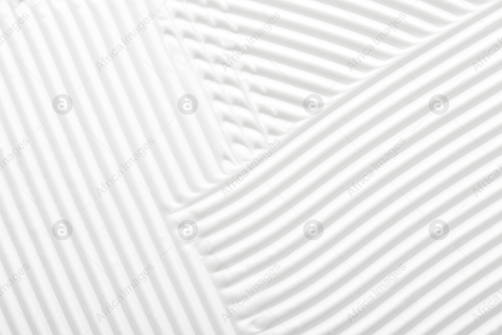 Photo of Texture of face care cream as background, top view