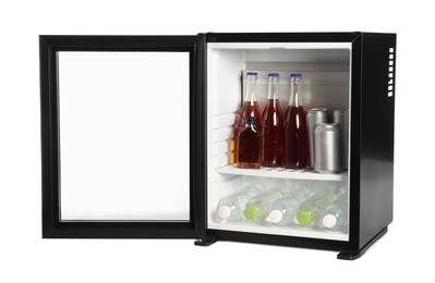 Photo of Mini refrigerator with drinks isolated on white