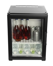 Photo of Mini refrigerator with drinks isolated on white