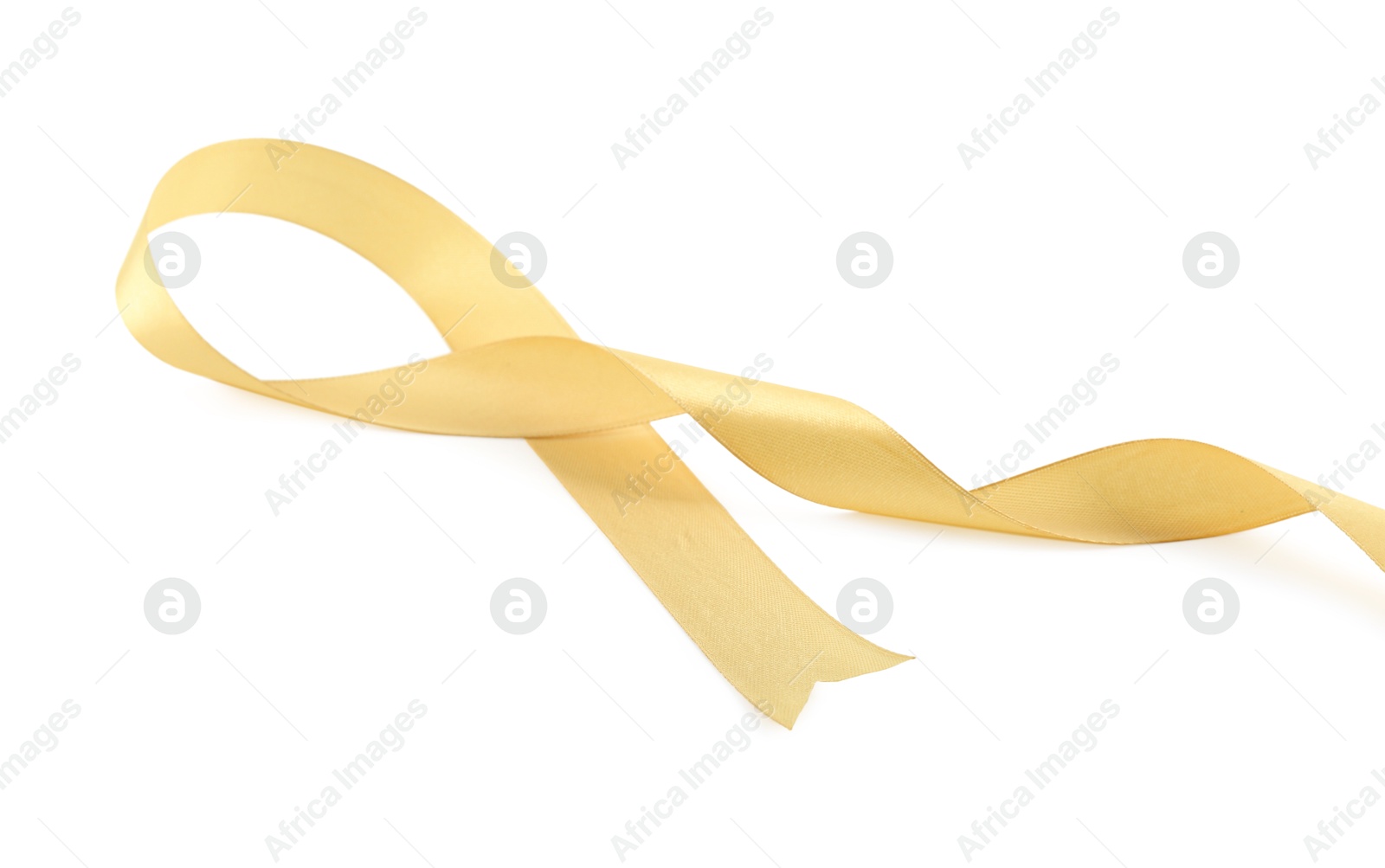 Photo of One beautiful light yellow ribbon isolated on white